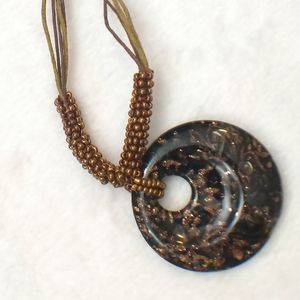 Black and gold glittery glass pendent necklace
